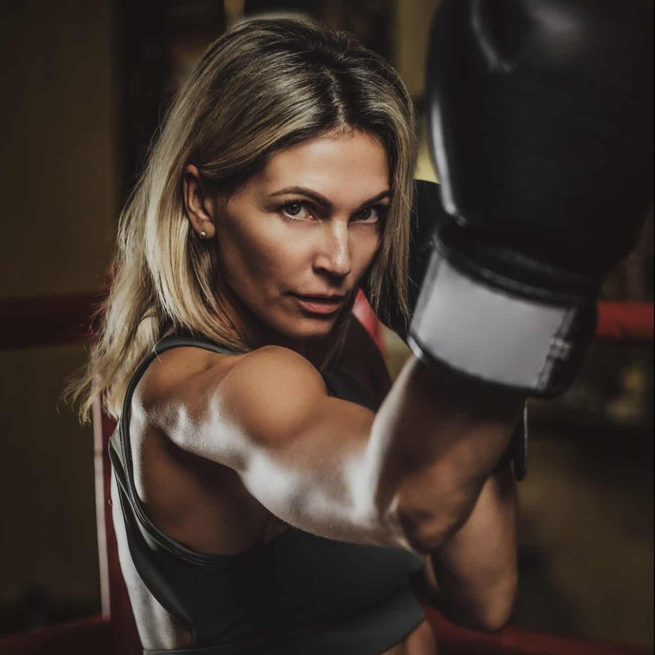 Portrait of experienced female boxer